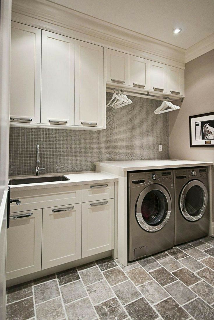 Maximizing Space: Laundry Room Cabinets
with Hanging Rod