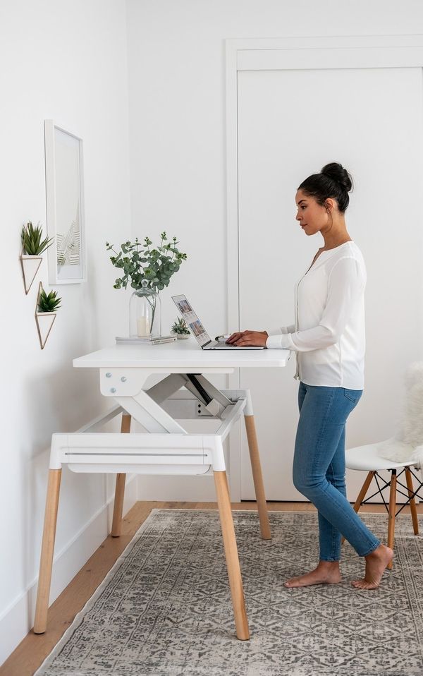 Creating a Healthier Work Environment
with Adjustable Height Office Desks