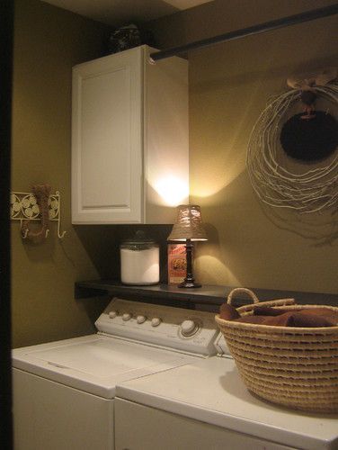 Maximize Space Efficiency with Laundry
Room Cabinets and Hanging Rod