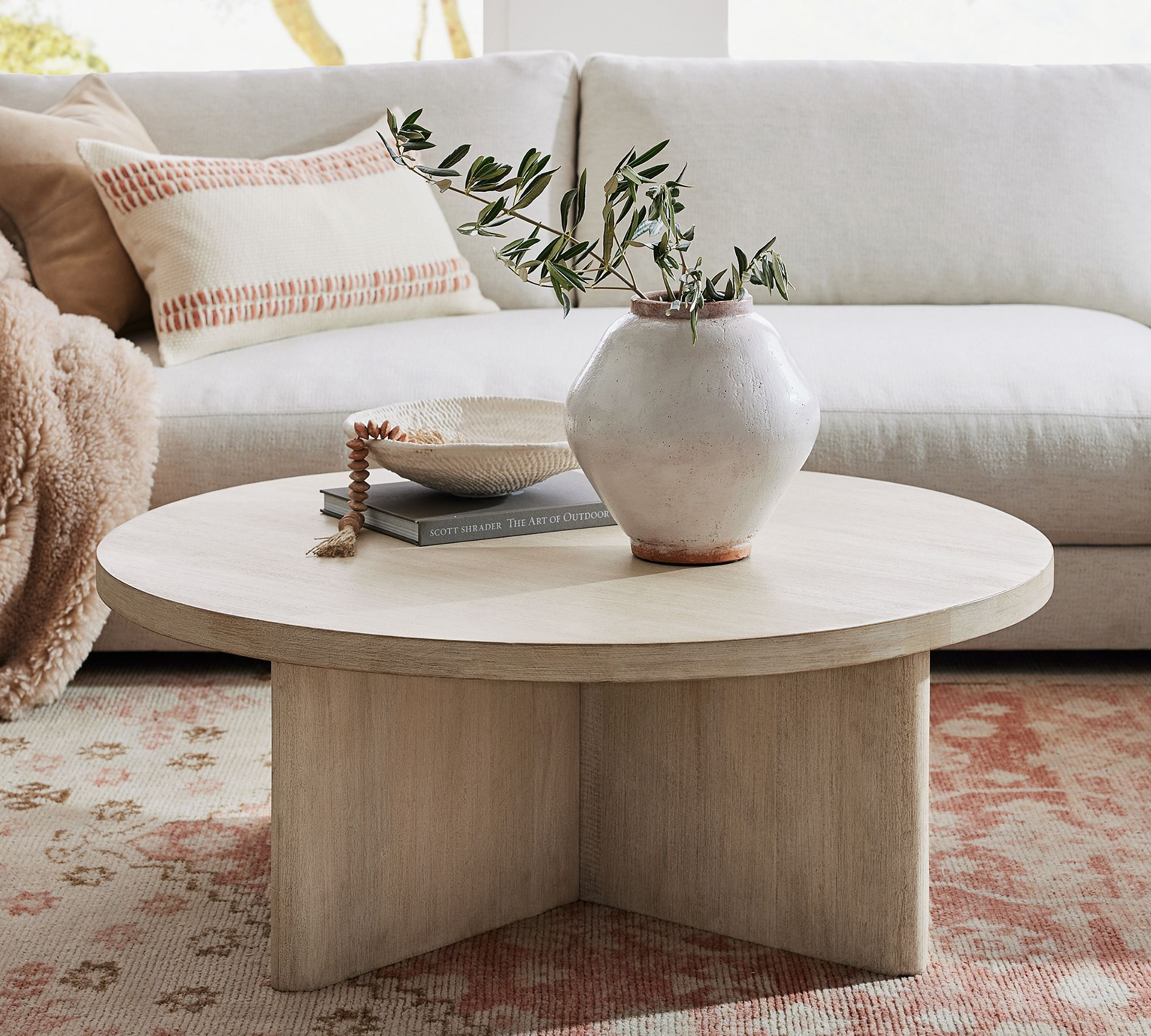 Choosing the Perfect Round Coffee Table
for Your Living Room