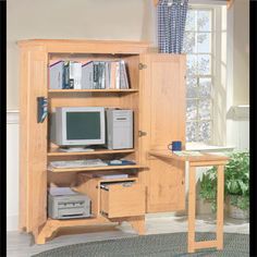 The Ultimate Space-Saving Solution:
Computer Armoire with Swing Out Desk