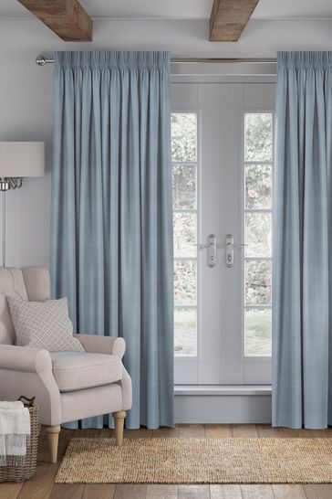 A Guide to Styling Your Space with Blue
and White Curtains