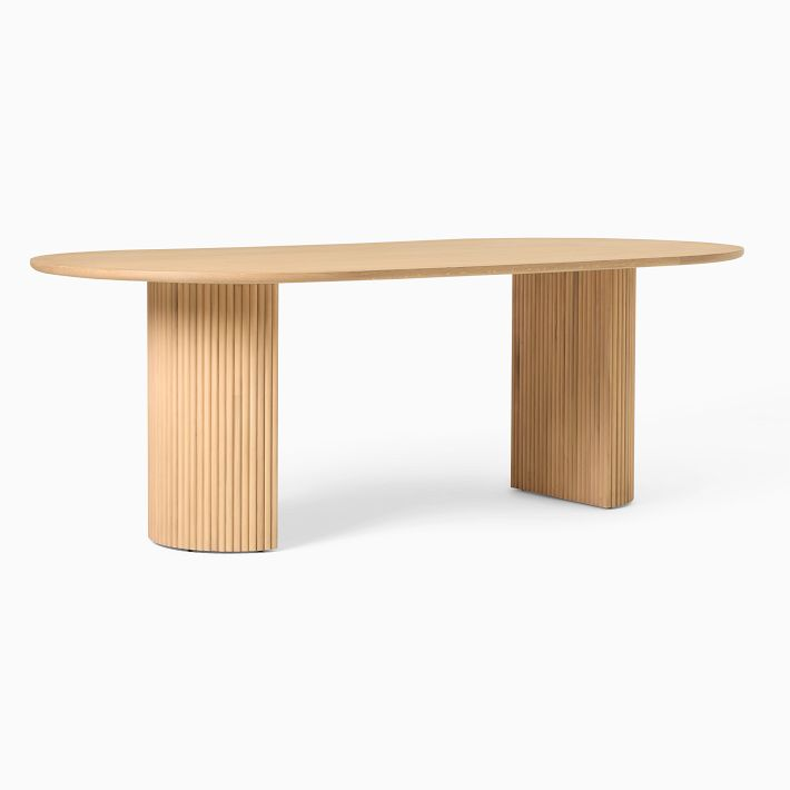 Elevate Your Dining Space with a Pedestal
Dining Table