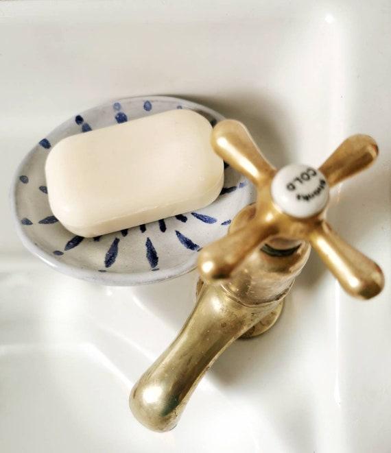 Handcrafted ‌soap‌ dishes add a ⁣personal touch to your farmhouse ‍bathroom