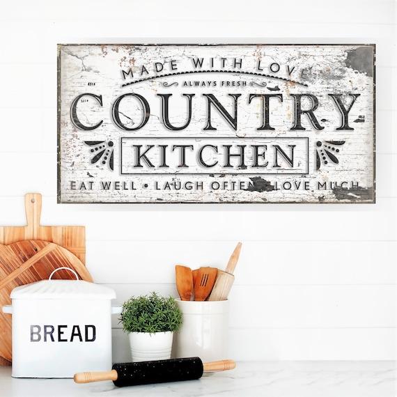 Decorate with vintage signs ⁢to enhance the farmhouse feel in your small kitchen